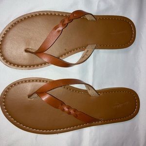 Brown flip flop sandals